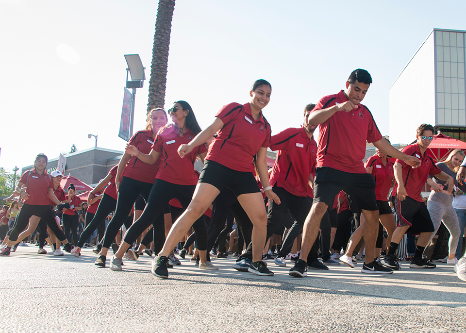 CSUN New Student Orientation leaders dance to help fire up new students and welcome them to CSUN.