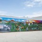 The Physical Plant Management Art Mural tells a story, it starts from morning to night of what a PPM faculty may go through. Photo by David J. Hawkins.