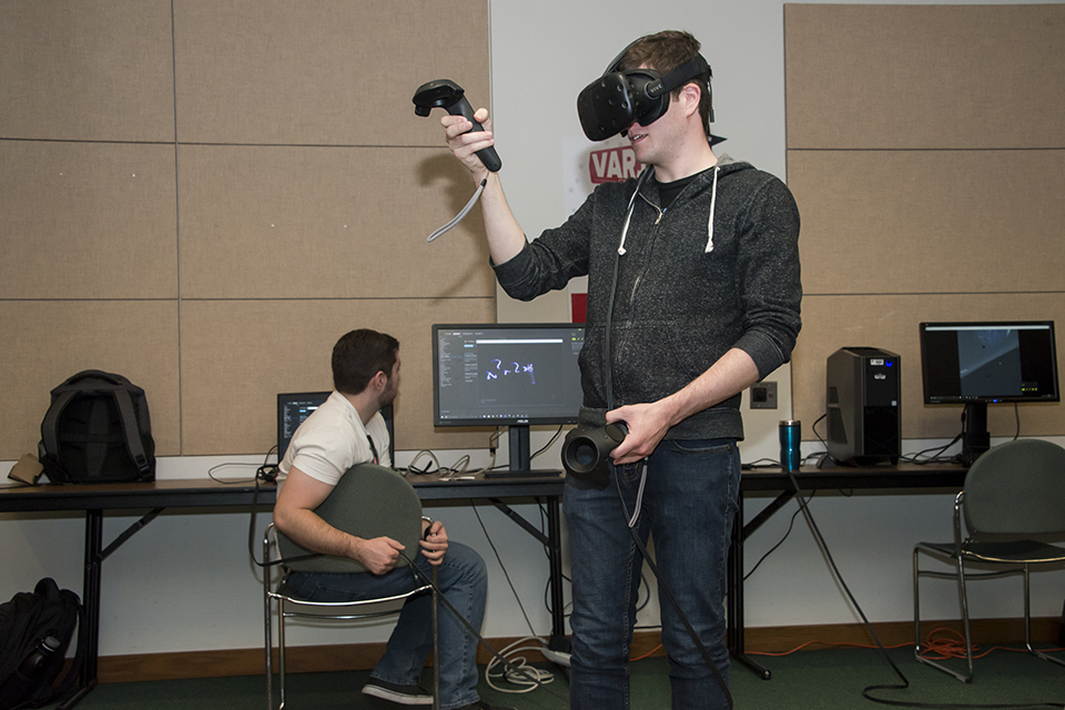 Students test out Google Tilt Brush Virtual Reality game.