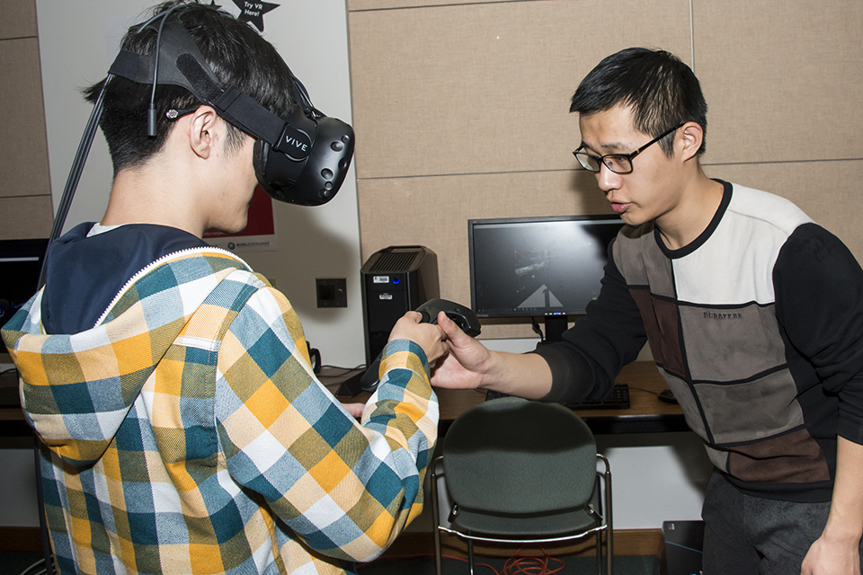Students learn to navigate through a virtual reality game.