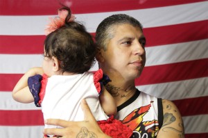 Maricio, a deported U.S. Army Afghanistan War combat veteran, with his daughter at the Deported Veteran Support House in Tijuana, Mexico. Photo by Joseph Silva.