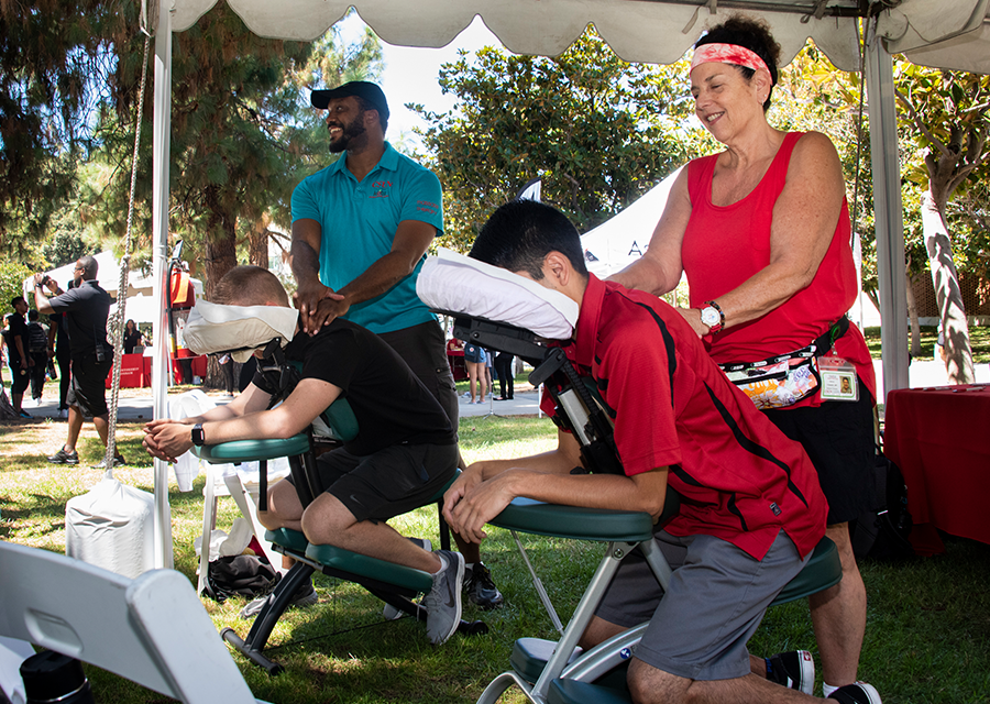 Matadors get treated to a free massage during the President's Picnic on the Bayramian Hall Lawn on Aug. 29.