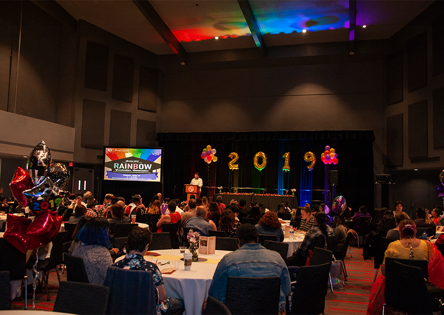 LGBTQ students and their families and friends gather at the Northridge Center for the Rainbow Graduation Celebration on May 17.