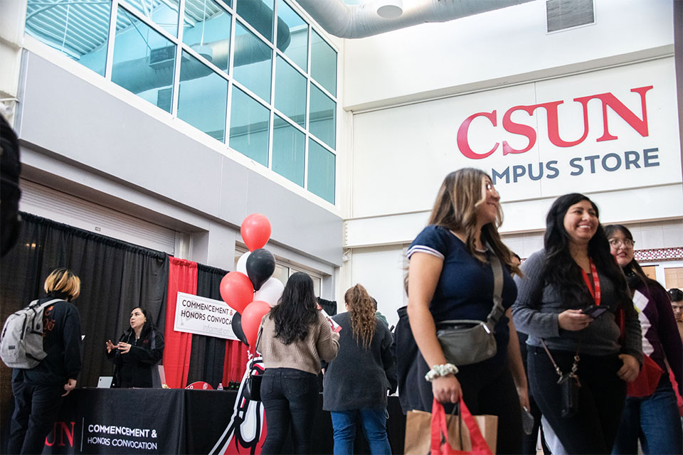Students gather in front of the Csun Bookstore for GradFest 2023