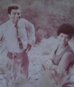 An undated family photo of Rick and Dolores Ratcliffe, standing in a garden.