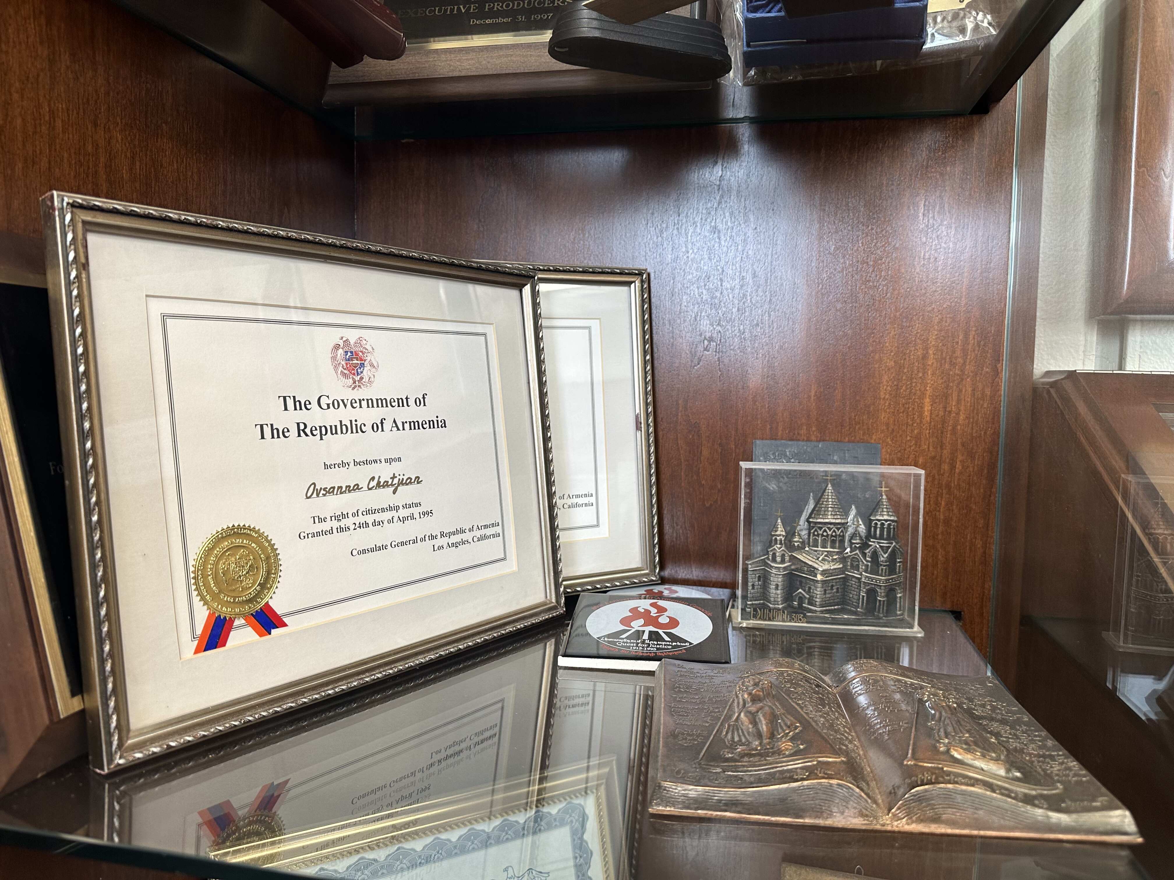 An award and some other memorabilia on display in Sierra Hall. Photo by Kaley Block. 