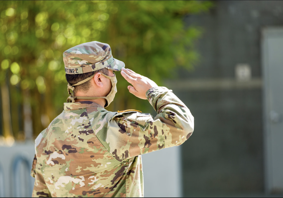 A military student saluting