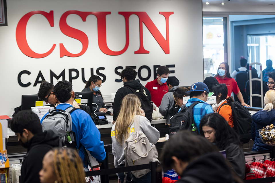 Students lined up in foreground at the CSUN Campus Store.