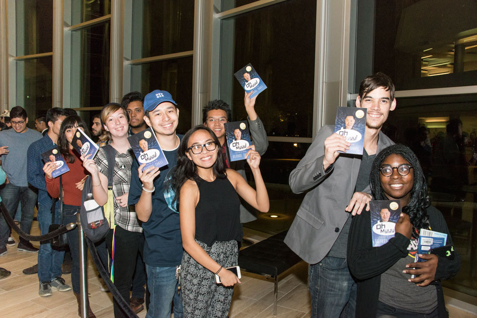 Fans with George Takei's book.