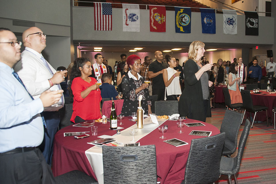 Family and friends applaud during Veterans Graduation Reception.