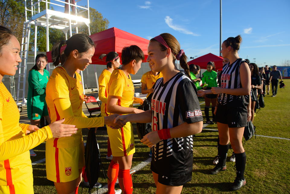 CSUN and Chinese national team members meet before the match.