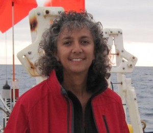 Head shot of Dayanthie Weeraratne on a boat in the ocean.