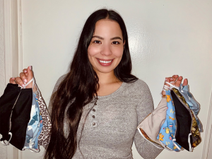 CSUN student Edith Polino shows off masks she made for health care workers.