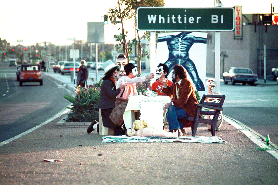 Art collective Asco performs on Whittier Boulevard, where the clash between antiwar protesters and police occurred on the day of the Chicano Moratorium.