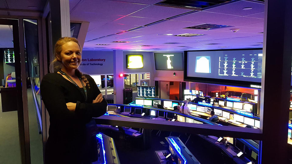 CSUN student Heather Lethcoe stands inside NASA's Jet Propulsion Laboratory – where she interns and works on the Mars 2020 mission.