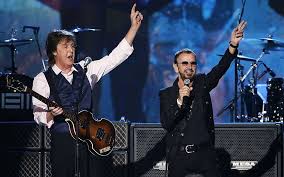 Paul McCartney and Ringo Starr on stage.