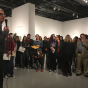 Retiring CSUN Art Galleries director Jim Sweeters talks to students during a High School Invitational even at the Main Gallery.