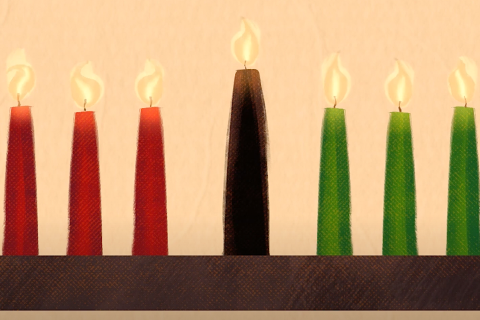 Lit red, black, and green candles.