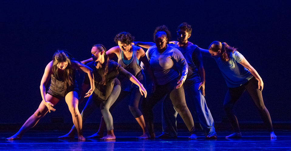 A line of CSUN students dance in a performance called 