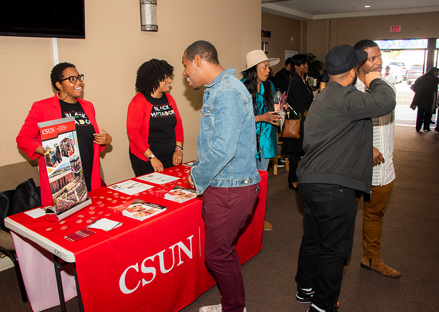 A CSUN information booth at at Living Faith Cathedral.