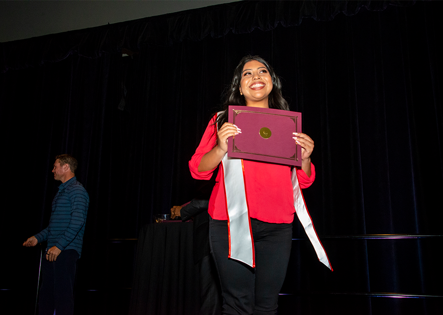 A student veteran with her award at the Veterans Graduation Reception 2019, held on May 16 at the Northridge Center.