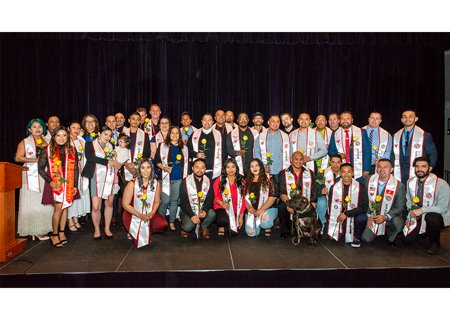 CSUN's graduating student veterans smile for a group photo during the Veterans Graduation Reception 2019 on May 16 at the Northridge Center.